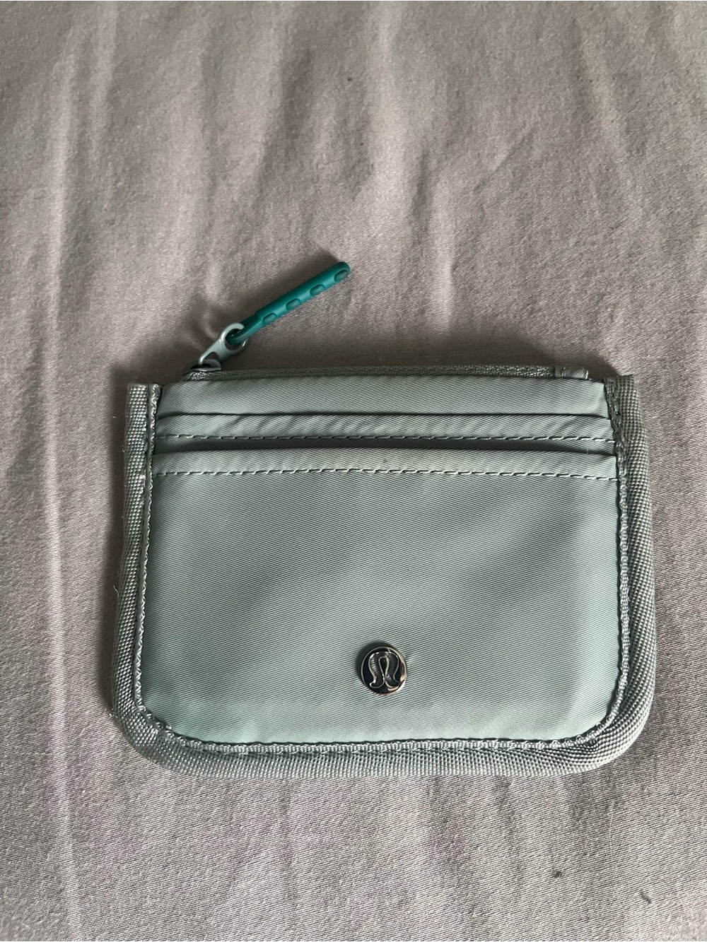 lululemon athletica Light Mint Green Card Wallet with Teal Zipper Pull